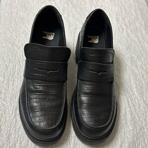 Sorel Black Slip-On Loafers with Platform Sole